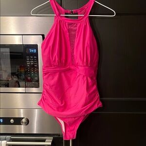 Bold Pink One Piece Swimsuit with Halter Neckline and Sheer Cutouts